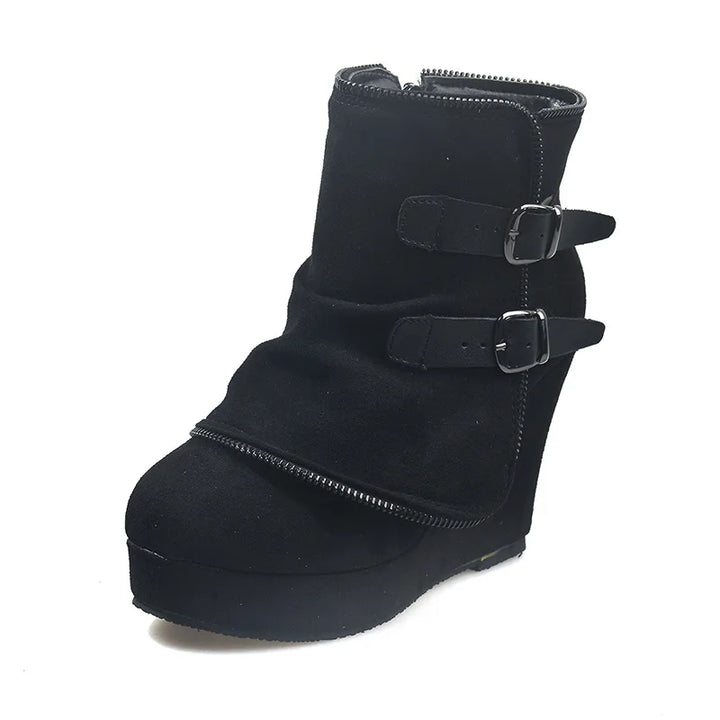 Black suede wedge ankle boot on white background