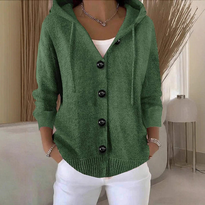 Woman wearing green hooded button-front cardigan sweater