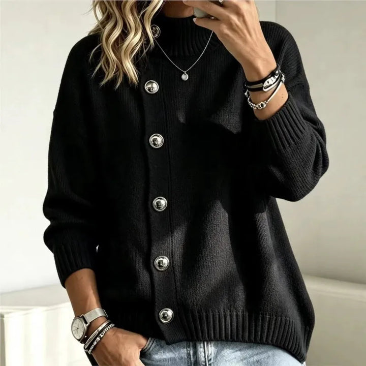 Woman wearing black button front mock turtleneck sweater