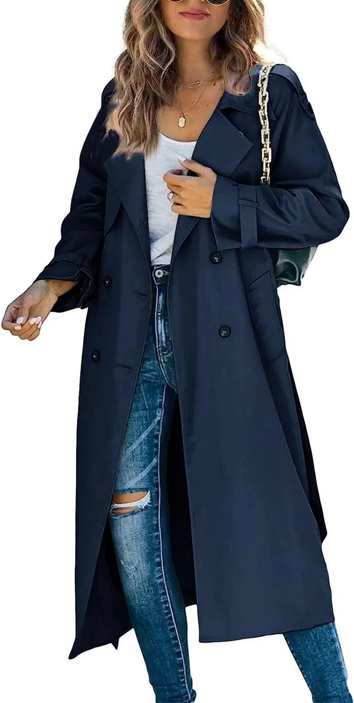 Woman wearing navy blue oversized double breasted trench coat