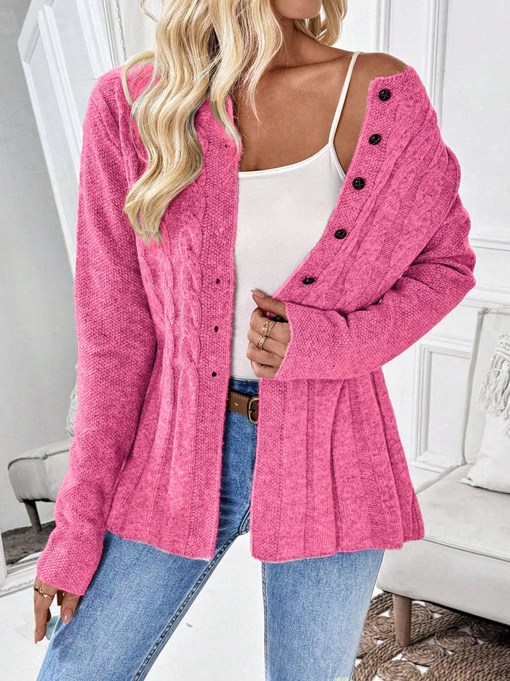 Woman wearing rose pink cable knit cardigan off shoulder style