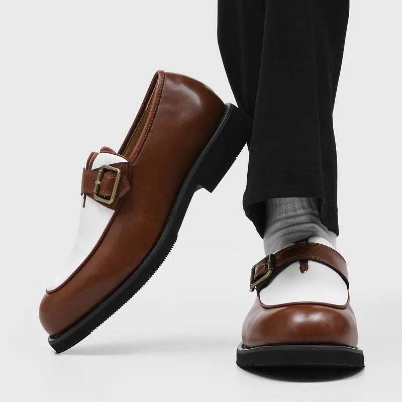 Brown and white two-tone leather loafers with buckle strap, side view