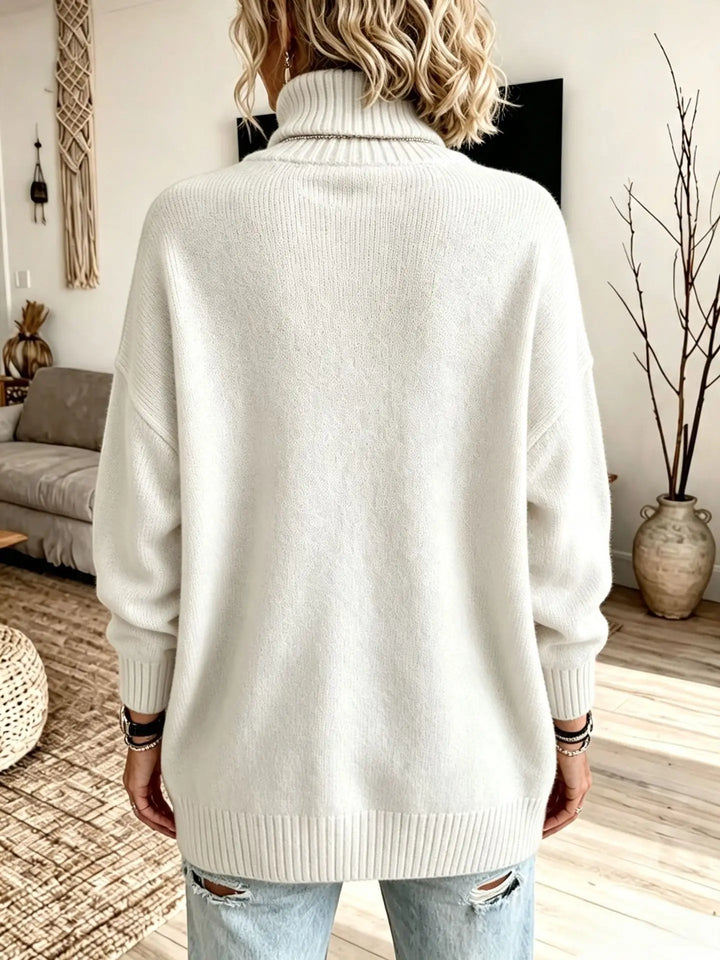 Back view of white turtleneck sweater