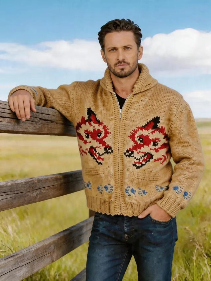 Man wearing camel fox graphic knit cardigan by wooden fence