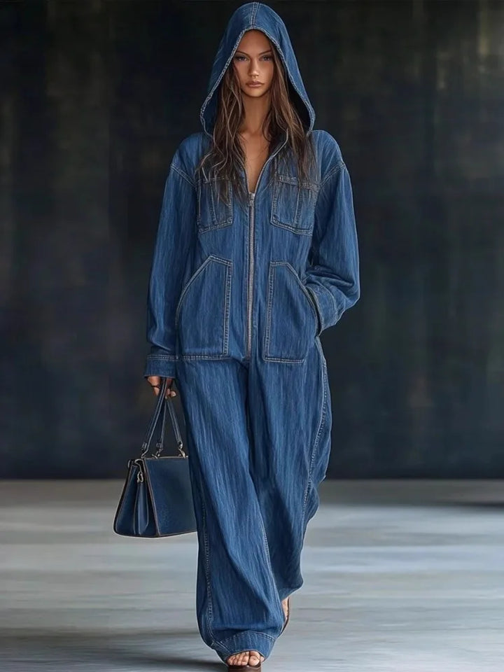 Woman wearing blue hooded denim jumpsuit full length front view