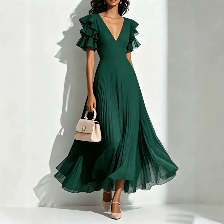 Emerald green pleated maxi dress with ruffle sleeves and deep V-neck, front view
