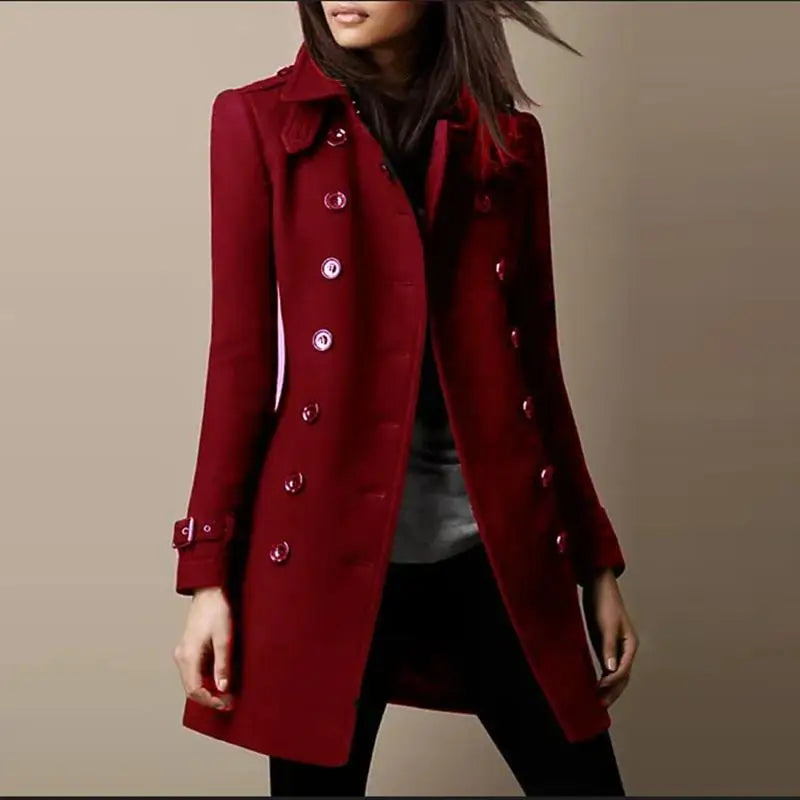 Woman wearing a wine red double-breasted mid-length coat, front view
