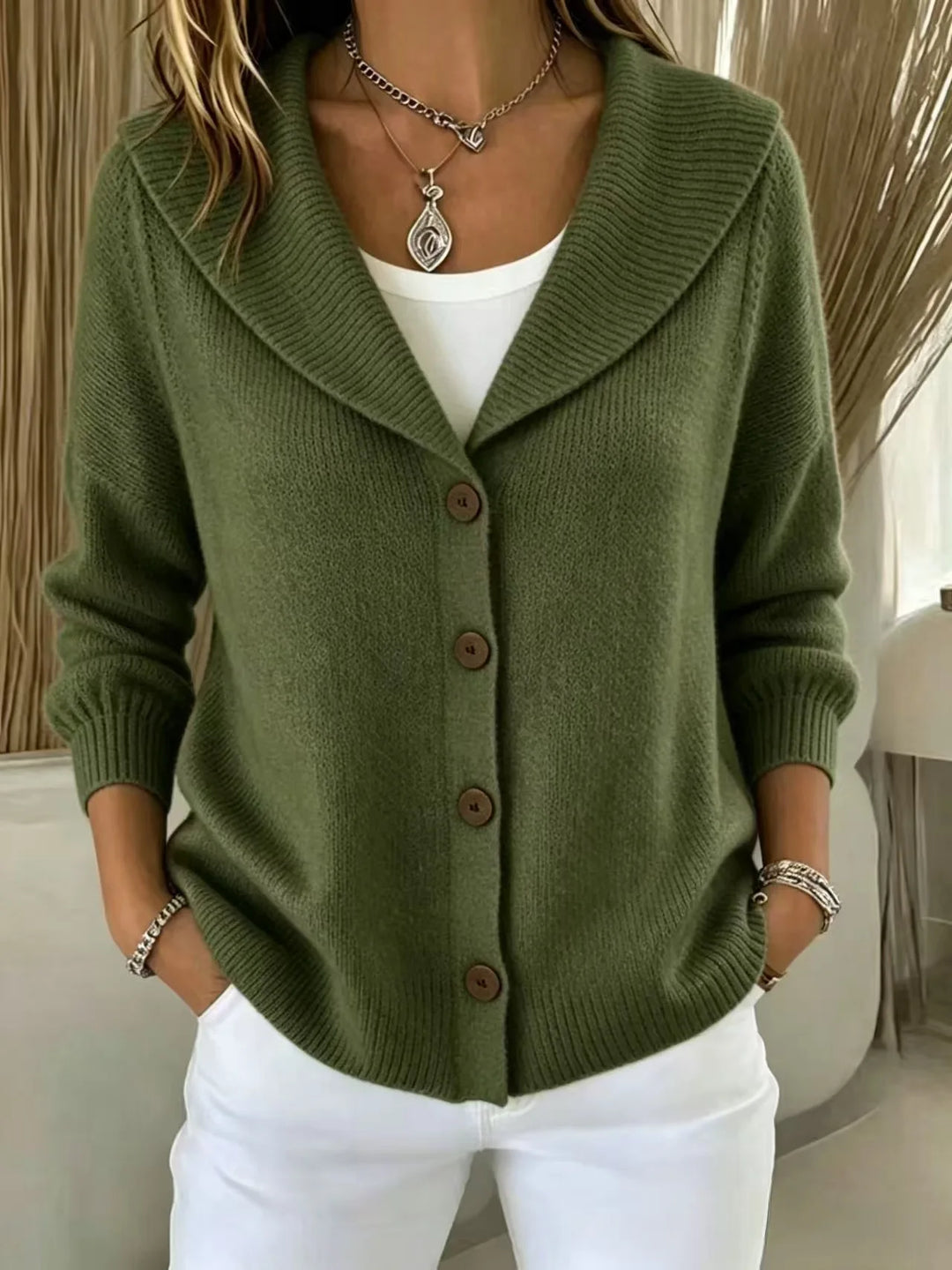 Woman wearing military green shawl collar button front cardigan