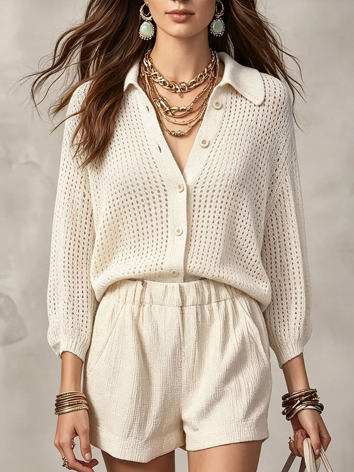 Woman wearing white open crochet knit cardigan with collar and buttons, front view