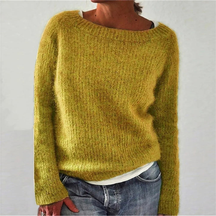 Woman wearing yellow ribbed knit sweater with boat neckline