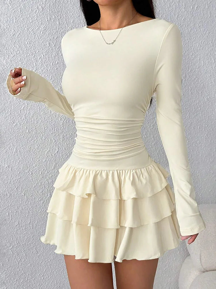 Beige tiered ruffle mini dress with flared sleeves, front view