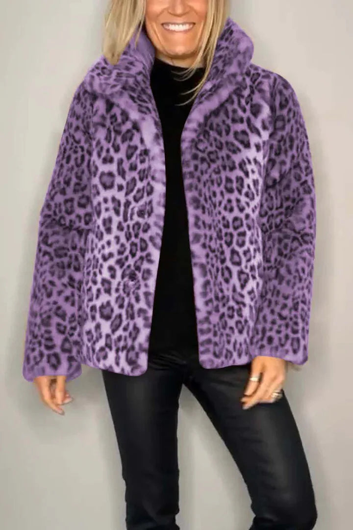 Model wearing purple leopard print faux fur coat