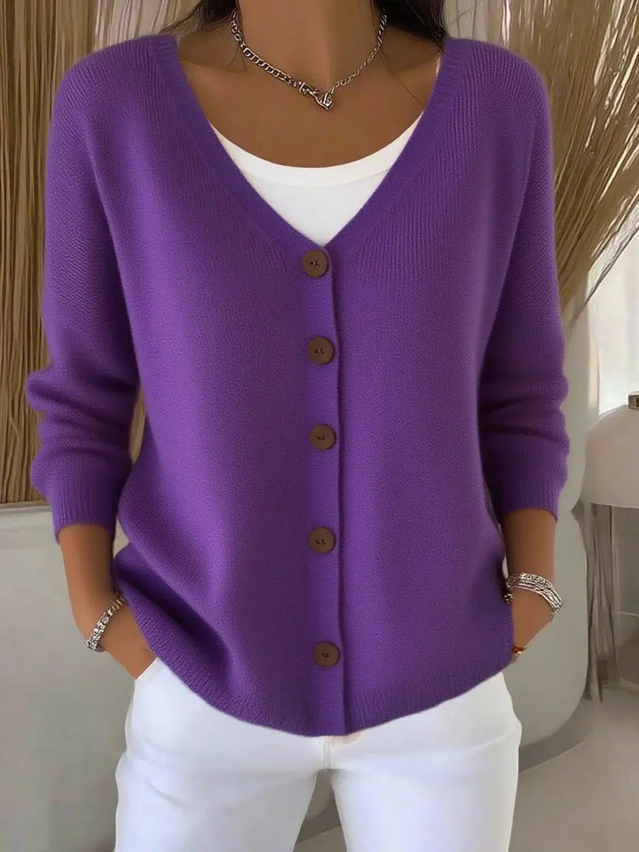 Woman wearing purple button front knit cardigan