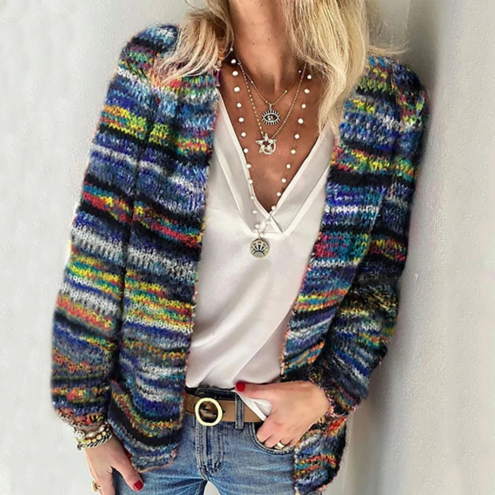 Woman wearing multicolor striped open-front cardigan, sky blue colorway, front view