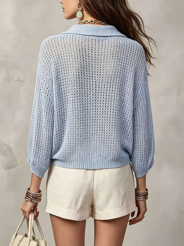 Back view of light blue open crochet knit cardigan