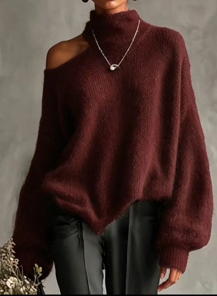 Woman wearing wine red cutout shoulder turtleneck sweater close up