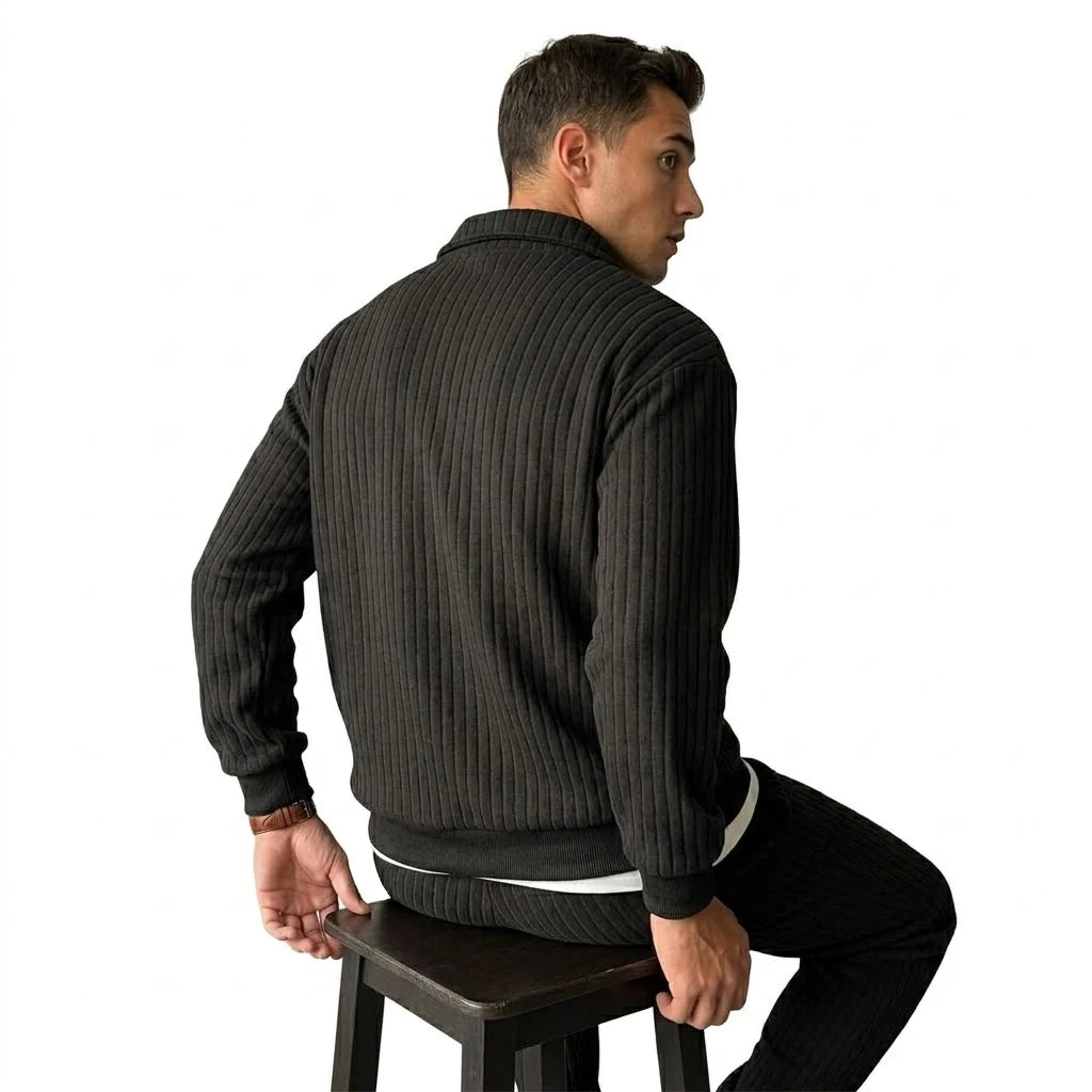 Back view of black ribbed quarter-zip pullover