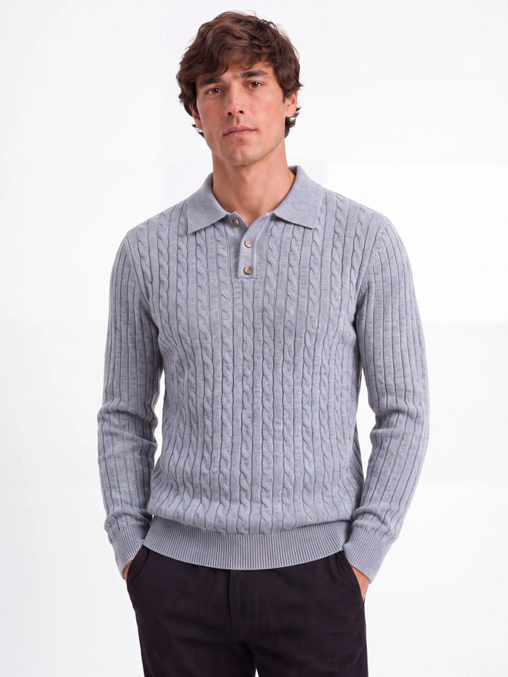 Man wearing light grey cable knit polo sweater