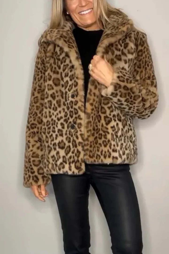 Model wearing leopard print faux fur coat with buttons closed