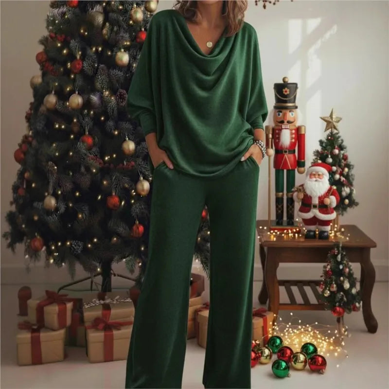 Woman wearing green cowl neck knit top and wide leg pants set