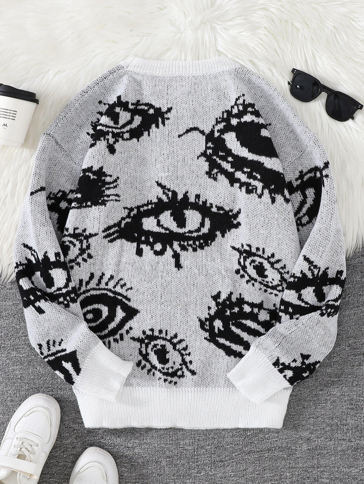 White eye print sweater back view flat lay