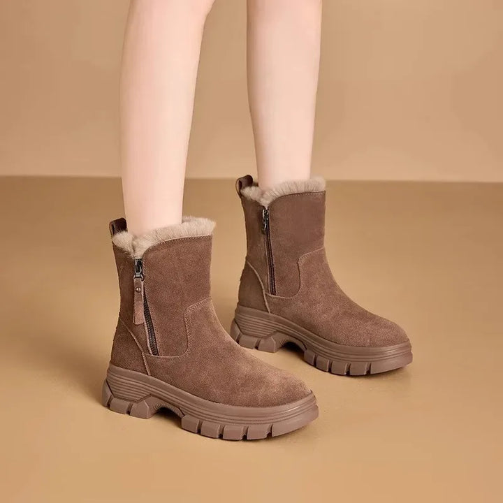 Brown suede snow boots with faux fur cuff and side zip