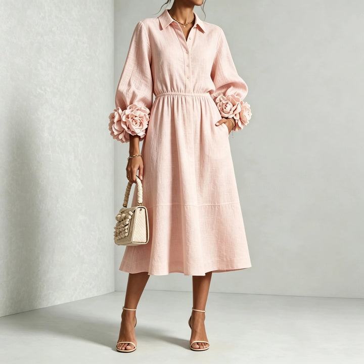 Woman wearing pink midi dress with 3D floral cuffs, full front view