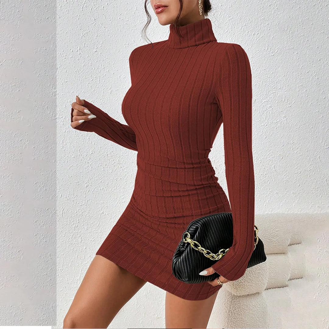 Woman wearing rust red ribbed knit turtleneck mini dress, front view