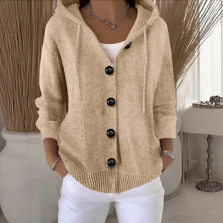 Woman wearing dark khaki hooded button-front cardigan sweater