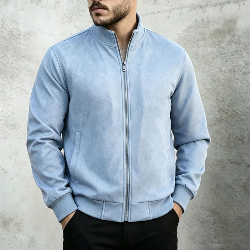 Man wearing light blue suede bomber jacket with hands in pockets