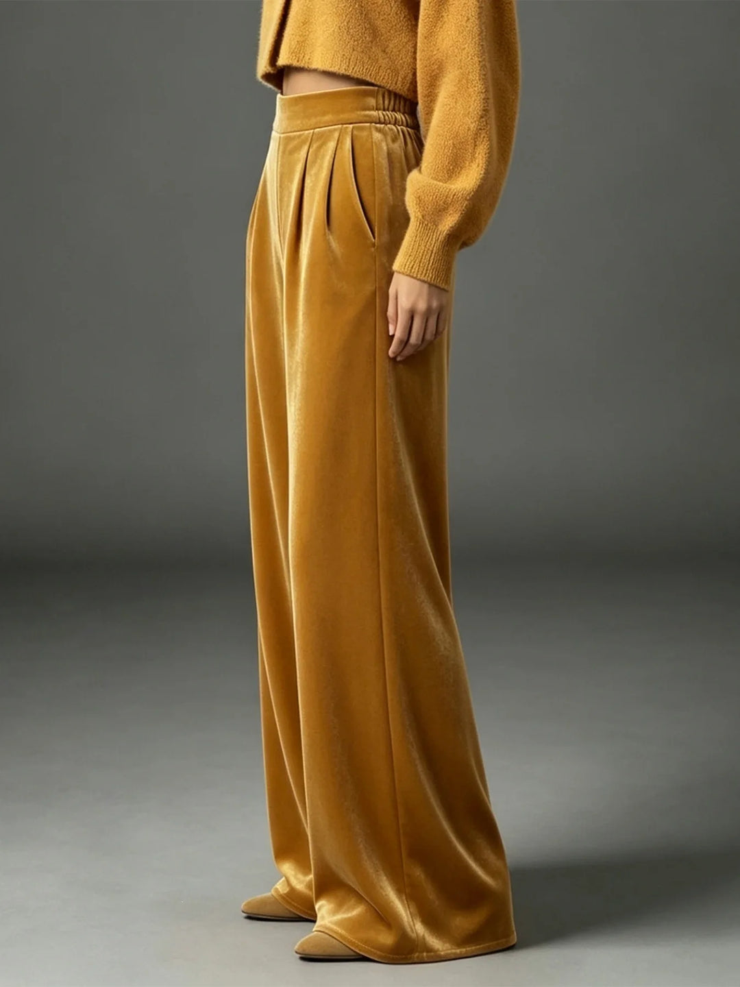Ginger yellow velvet wide leg pants, side view showing pockets