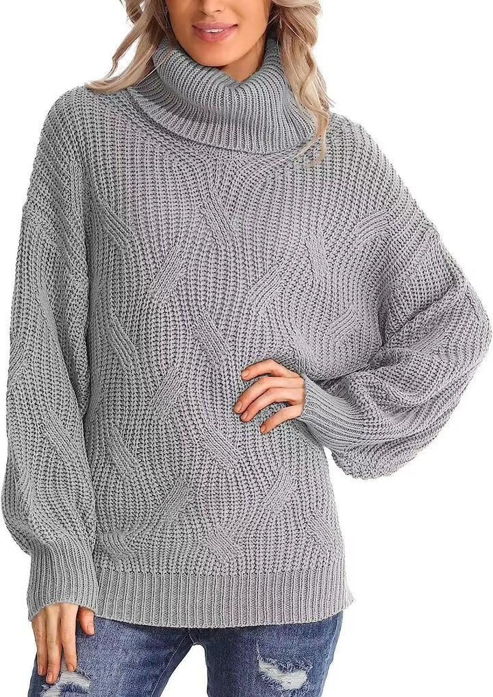 Woman wearing gray cable knit oversized turtleneck sweater