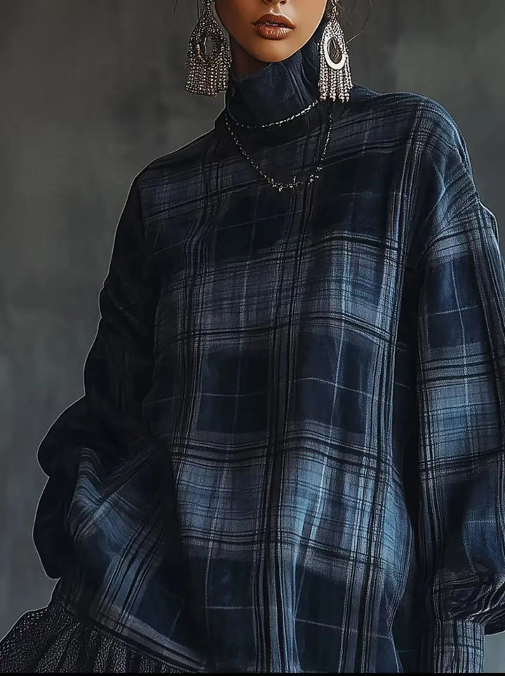 Close up of blue plaid turtleneck mini dress fabric and collar
