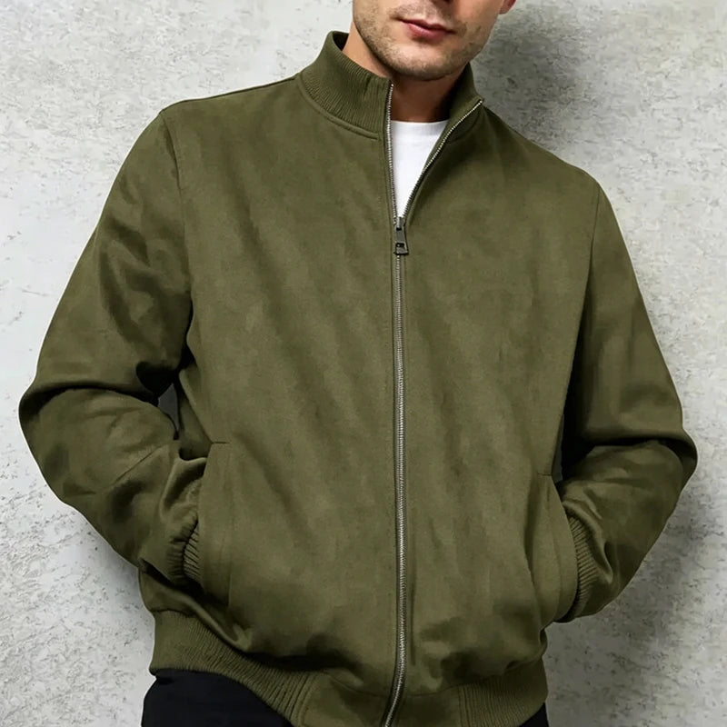 Man wearing green suede bomber jacket close up view