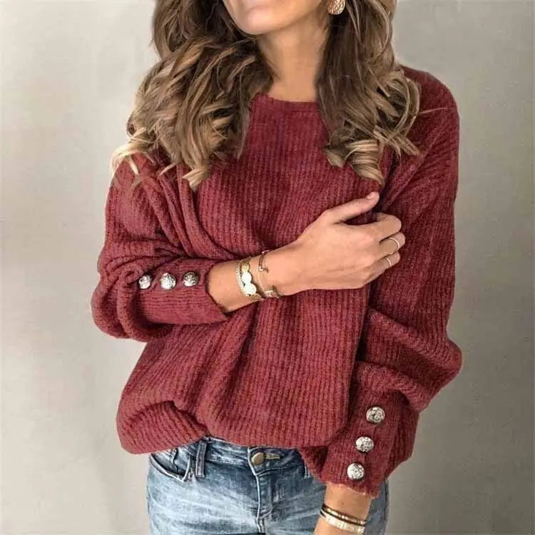 Woman wearing wine red ribbed knit sweater with button cuffs, front view