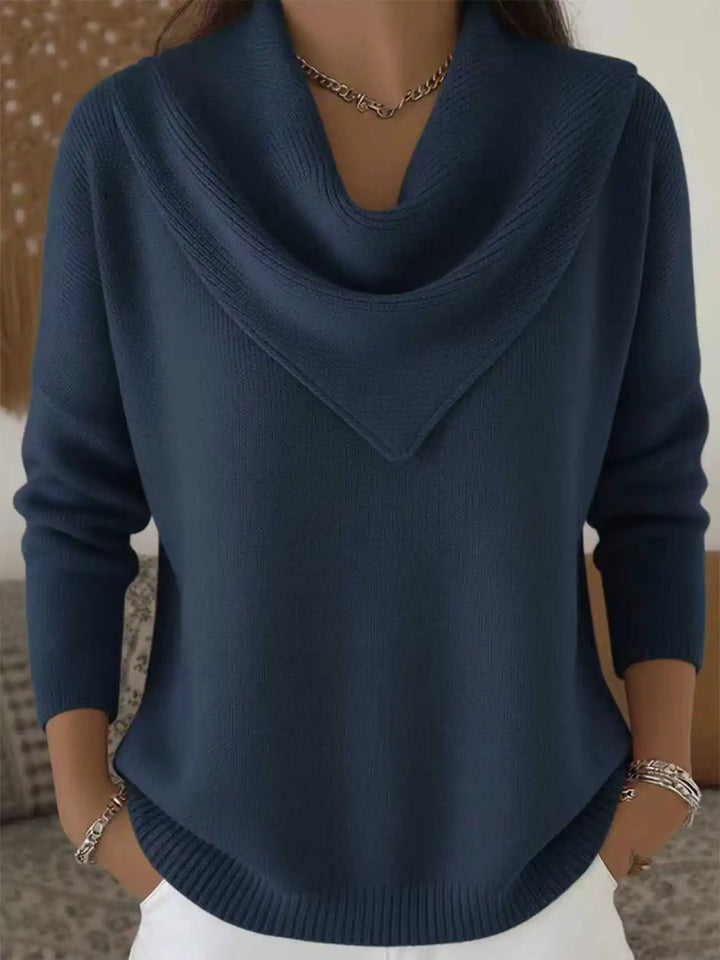 Woman wearing navy blue cowl neck ribbed knit sweater