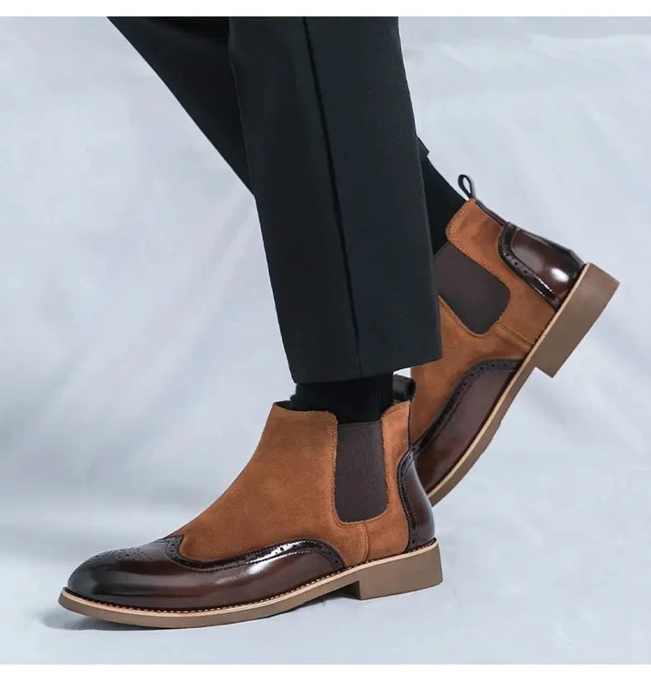 Brown two-tone Chelsea boots worn in motion