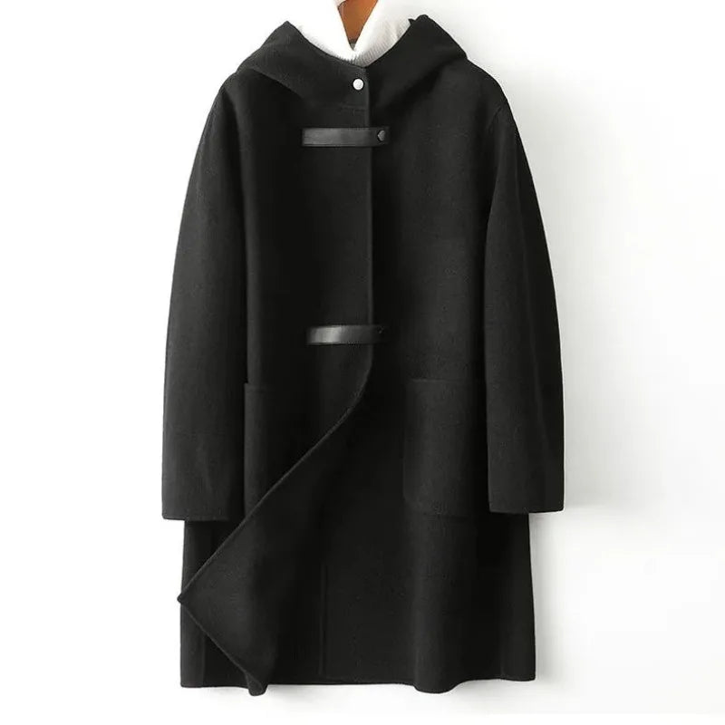 Black hooded wool coat with leather tab closures, front view