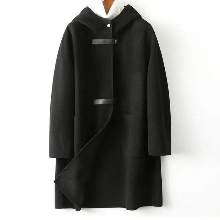 Black hooded wool coat with leather tab closures, front view