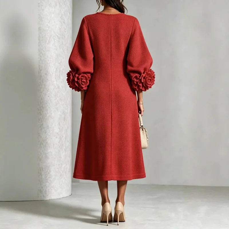 Back view of red knit midi dress with floral cuffs