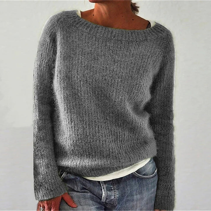 Woman wearing gray ribbed knit sweater