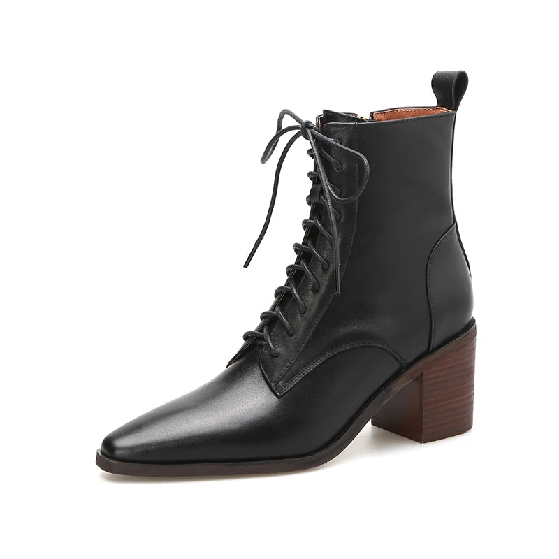 Black leather ankle boot angled studio shot