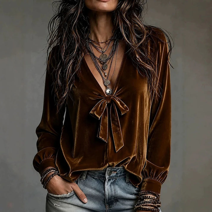 Brown velvet blouse with bow tie neckline, front view
