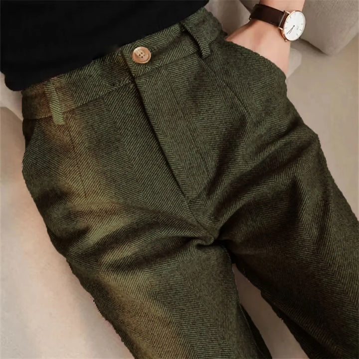 Herringbone trousers in olive green with tab waistband detail