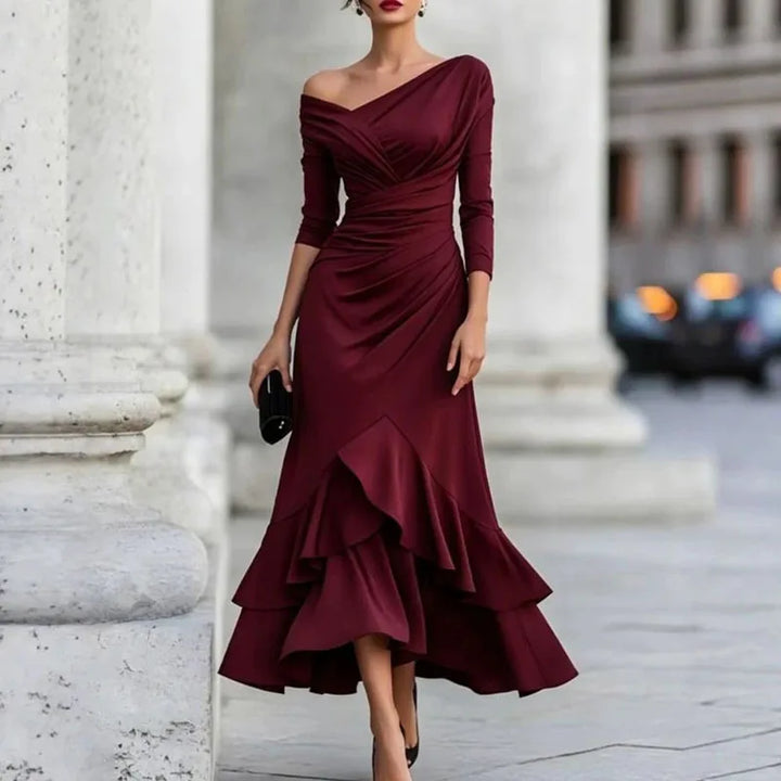 Woman wearing wine red off-shoulder ruffle hem mermaid dress