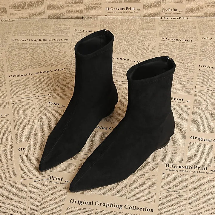 Black pointed toe ankle boots front view