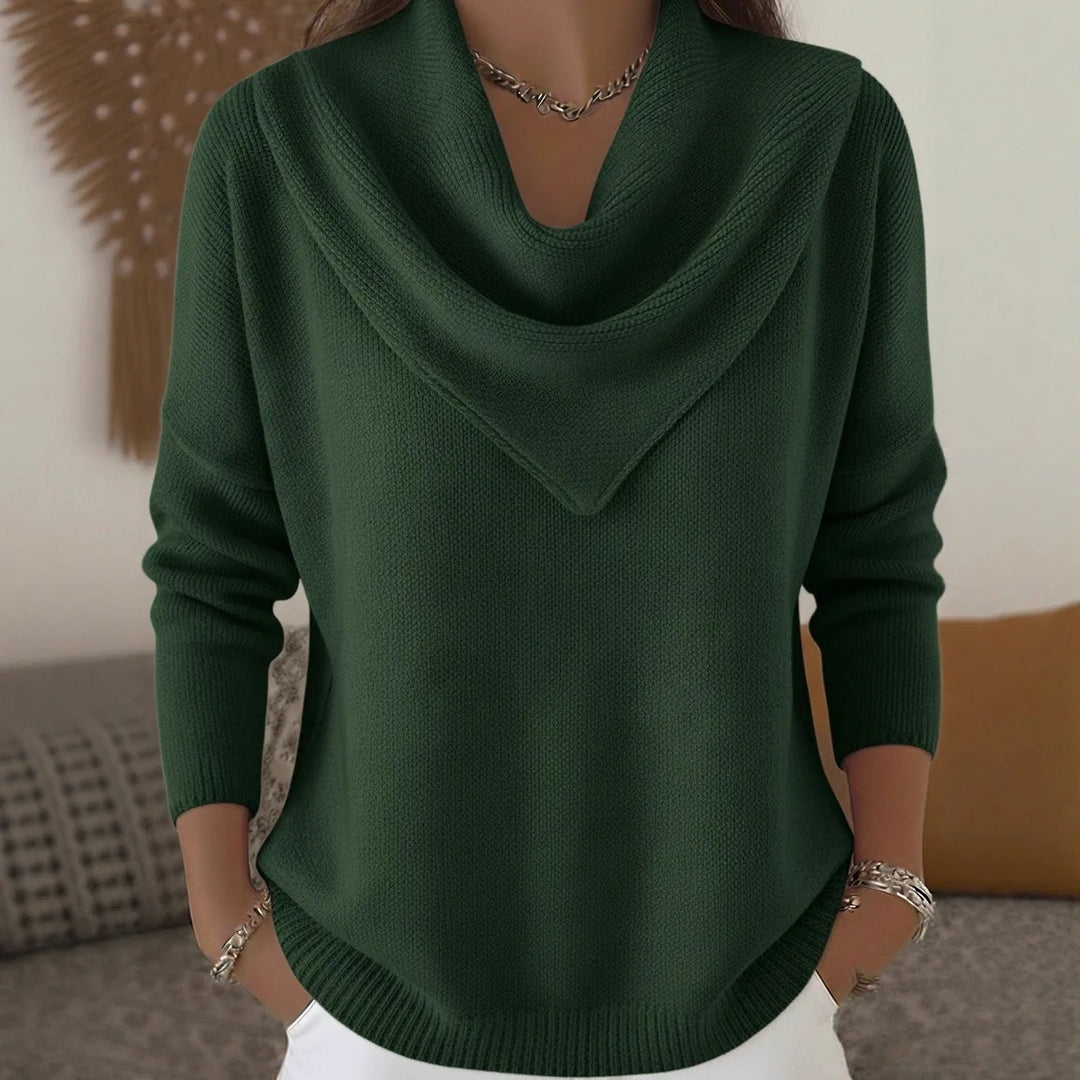 Woman wearing green cowl neck ribbed knit sweater