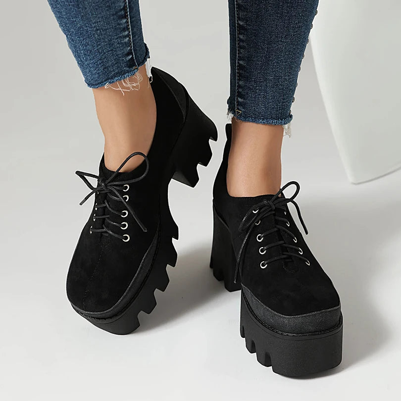 Black suede platform lace-up shoe side view