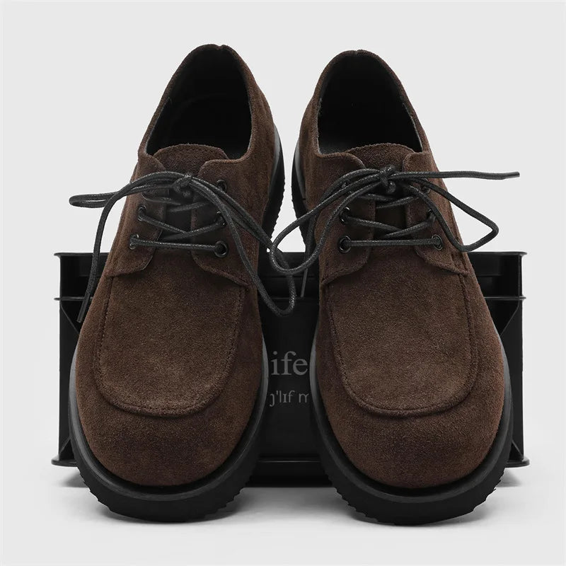 Front view of brown suede platform Derby shoes with laces
