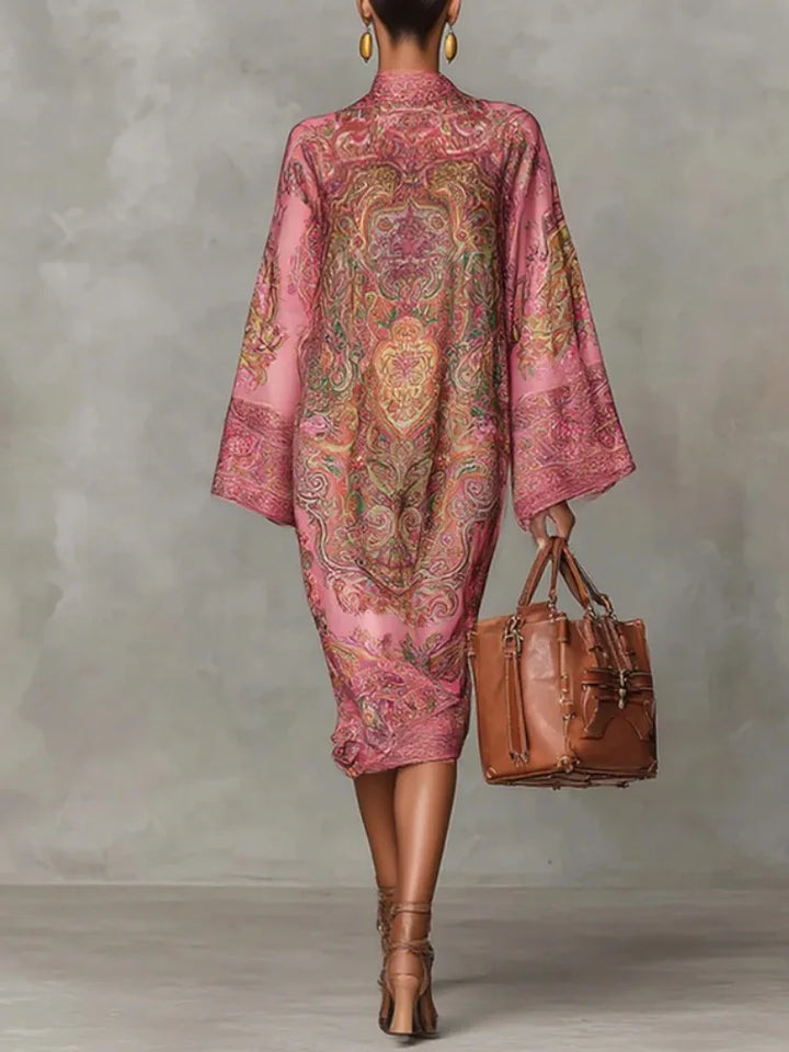 Back view of pink paisley print kaftan midi dress with batwing sleeves